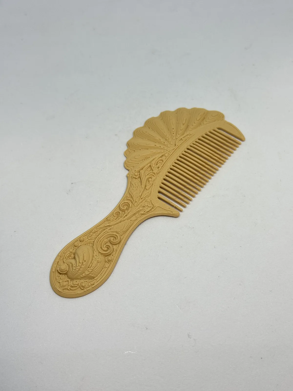 Shell-shaped comb - Fanchengwei | Nexprint: Free 3D Model Downloads